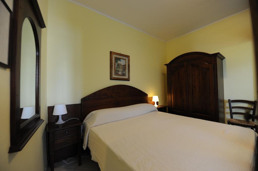 Residence Vacanza Mare Marina di Campo Pokoj fotografie