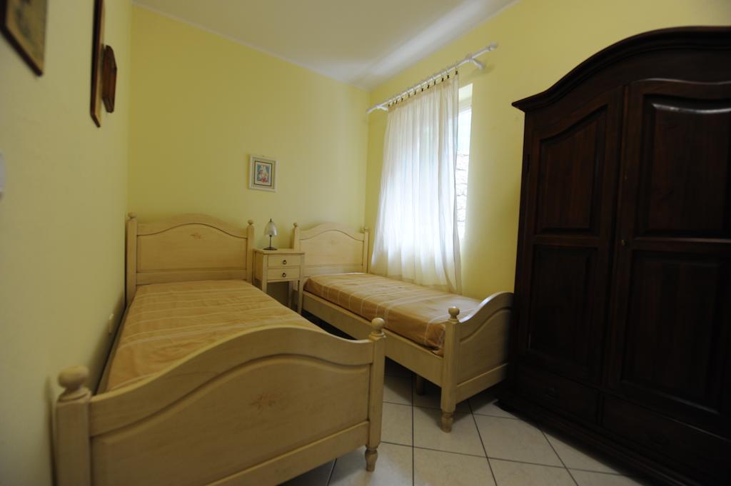 Residence Vacanza Mare Marina di Campo Pokoj fotografie